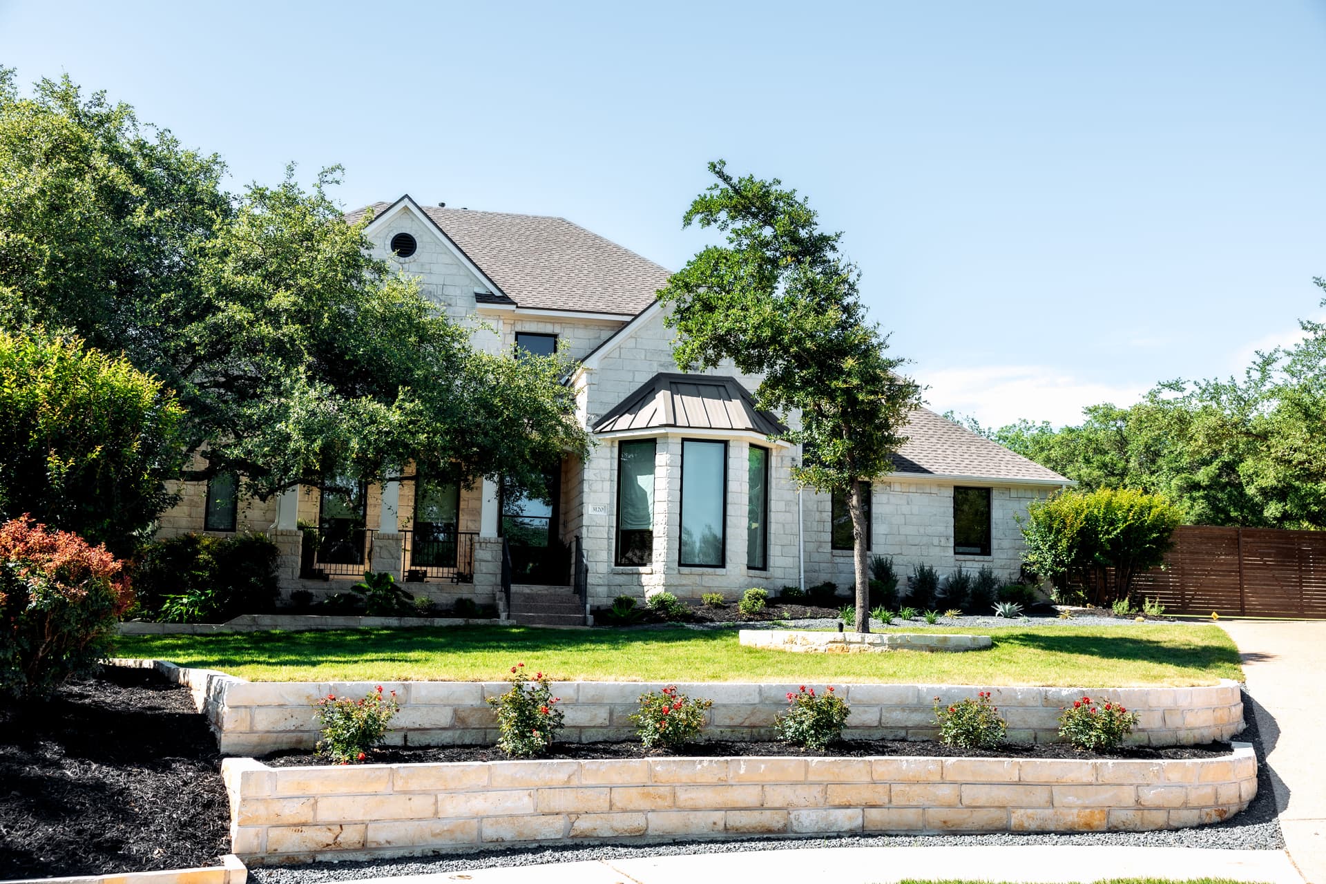 Gallery photos for Front Yard Curb Appeal Done Right with Limestone and Fresh Plantings: Image #1