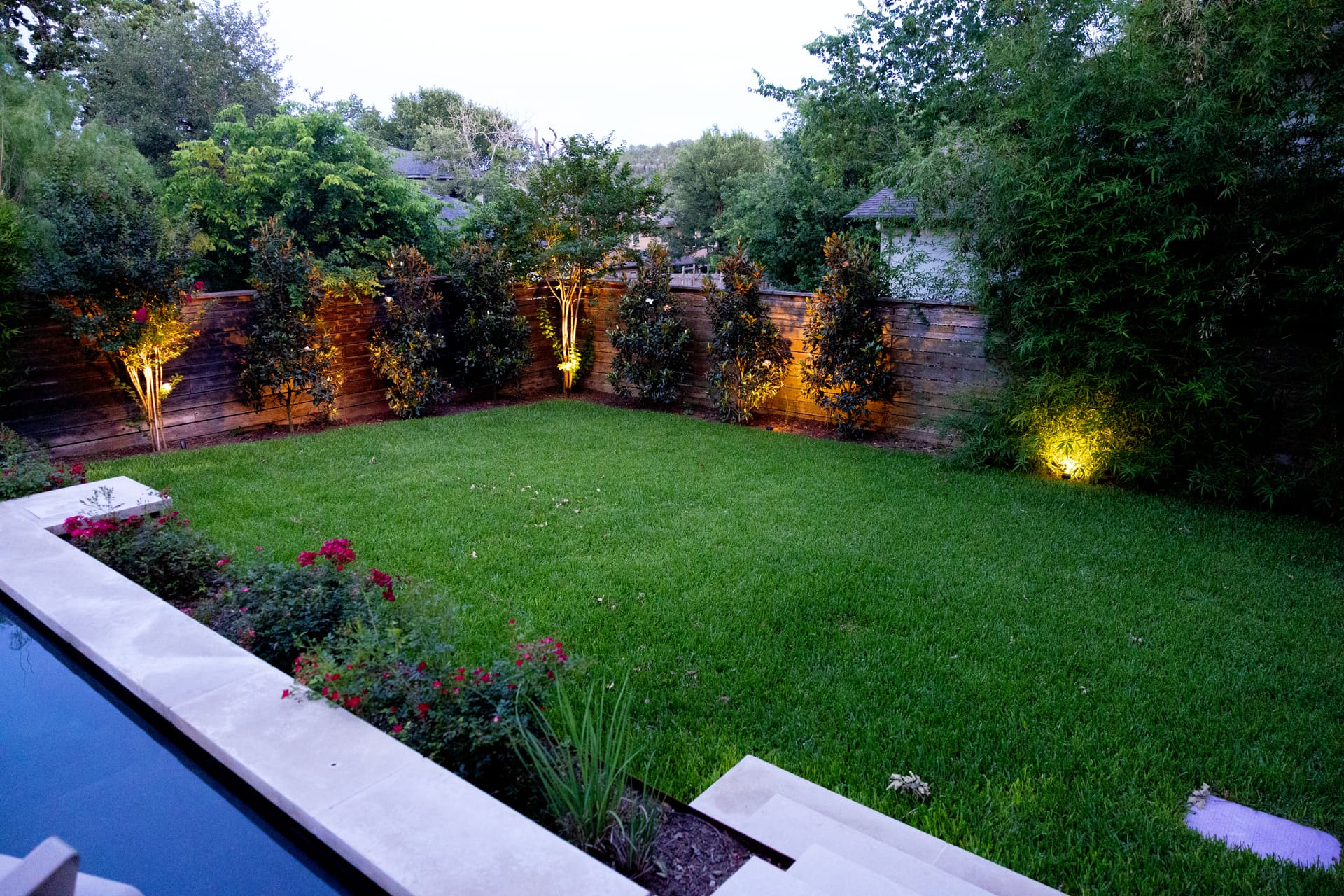 Gallery photos for Backyard Pool Landscape Design with Lighting and Privacy Plantings: Image #3