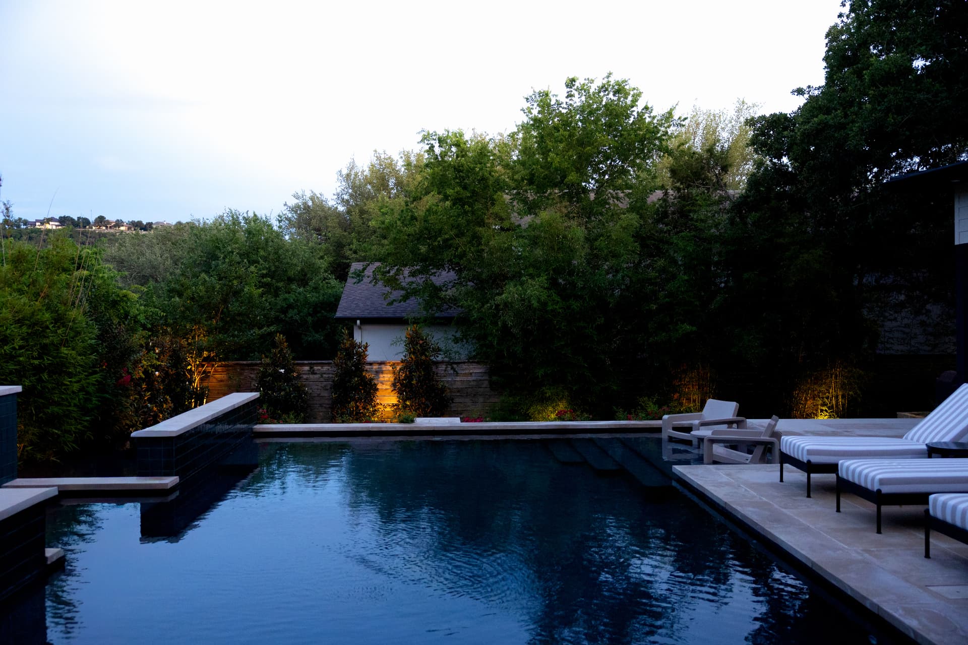 Gallery photos for Backyard Pool Landscape Design with Lighting and Privacy Plantings: Image #1